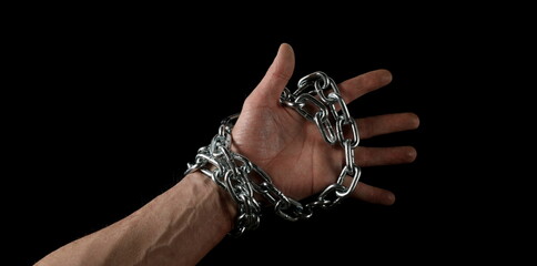 Hands in chains isolated on black, clipping path