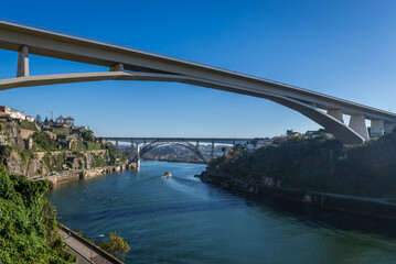 View on three bridges connecting Porto and Vila Nova de Gaia: Infante D. Henrique Bridge and...