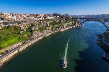 View from Infante D. Henrique Bridge on a Maria Pia Bridge old railway bridge in Porto city, Portugal