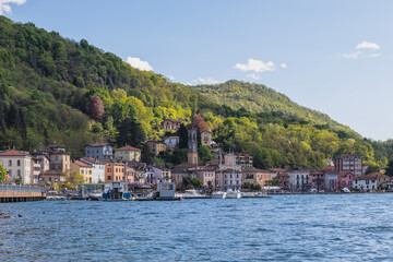 Fototapeta na wymiar High angle view of Portoceresio, a town on Lake Lugano in the province of Varese, Italy. Copy space