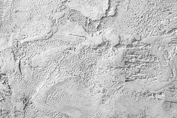 Naklejka premium Cement wall white color or vintage plaster background and texture with stains and crack
