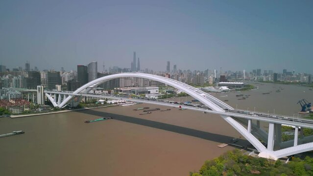 The drone aerial footage of Lupu bridge, Lupu bridge is a through arch bridge over the Huangpu River in Shanghai. connecting the city's Huangpu and Pudong districts.