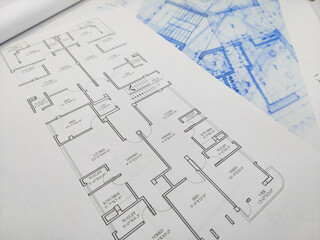 close up of blue prints from side angle