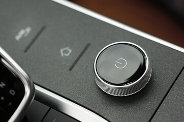 Settings control dial. Premium luxury SUV elements. Car air conditioning and climate control. Black...