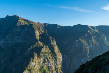 Mountain landscape. View of mountains on the route Queimadas Forestry Park - Caldeirao Verde. Madeira Island, Portugal, Europe.