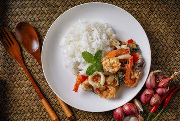 Thai food, stir-fried basil, stir-fried basil with shrimp and squid, popular Thai food. popular Thai food concept, spicy food