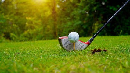 Golf ball and golf club in beautiful golf course at Thailand.