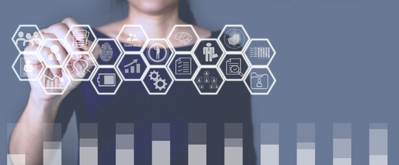 Businesswoman hold a pen and pointing with graphic of polygon and human resource icon for business...