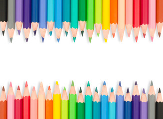Fototapeta Isolated set of rainbow color wooden pencils. Multicolored bright background for your text. Frame obraz
