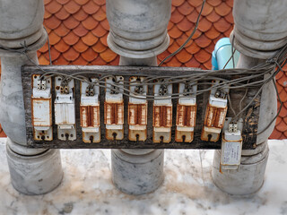Row of Old Rusty Conventional Ballasts for Lighting