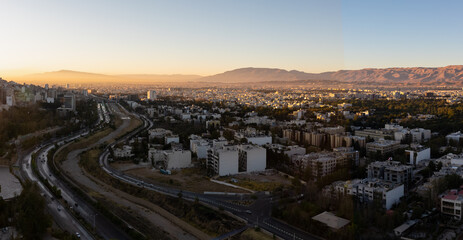 Aerial view of skyline and cityscape of historical city of Shiraz at sunrise, Shiraz, Fars Province, Iran, known as City of Love and Literature.