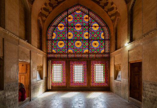 Beautiful colored glass windows in the palace of Arg of Karim Khan or Citadel in downtown Shiraz, Fars Province, Iran. Heritage and tourist attraction.