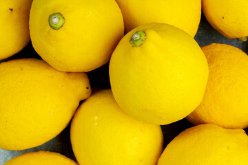 whole yellow lemons isolated on bright background. Lemons citrus fruit, healthy, summer. Copy space