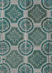 close-up of a tiled wall with vintage hand crafted tiles in Alcobaça, Portugal