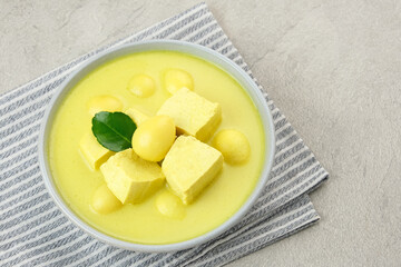 Sayur Terik Tahu Telur Puyuh, made from tofu, quail egg and coconut milk. Indonesian traditional food
