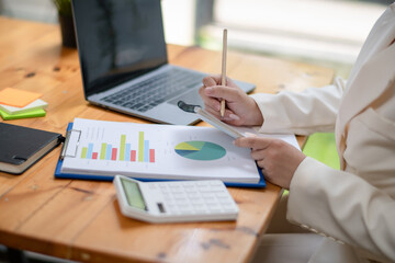 business women checking  plan business and take a note. analyzing the financial report. Economic business discussions.