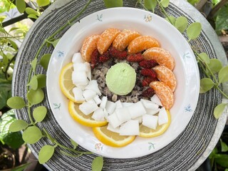 Oat overnight milk with green tea Greek yogurt with orange, mulberry, coconut and lemon