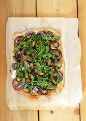 Puff pastry tart with mushroom, rocket and ricotta cheese