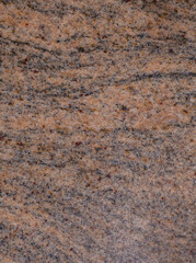 Tło granit brązowy struktura w zbliżeniu makro