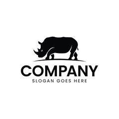 Vector illustration of a silhouette of a rhino standing on isolated white background