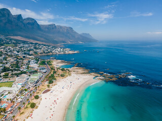 drone aerial view over Camps Bay Cape Town , Camps Bay beach drone aerial view during summer in Cape Town Sout Africa, drone view at the beach during summer