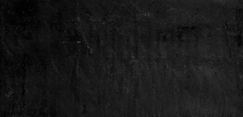 Black speckled hand-painted illustration texture design of old distressed vintage grunge concrete with gray stains. damaged textured abstract washed cement backdrop as web banner background.