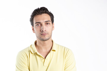 Close-up portrait of handsome man standing isolated on white background	