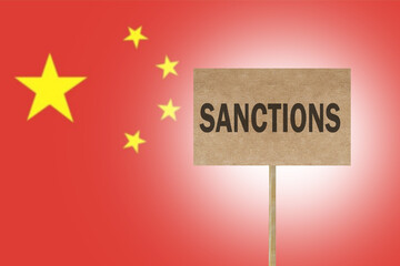 poster with message economic sanctions for China on background of flag China. sanctions against...
