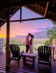 Mountains and grassland near Hermanus at the Garden Route Western Cape South Africa Whale coast. A couple man and woman mid age in front of their lodge during a vacation in South Africa