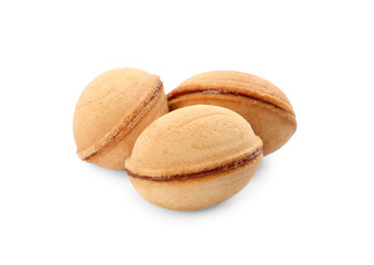 Delicious nut shaped cookies with boiled condensed milk on white background