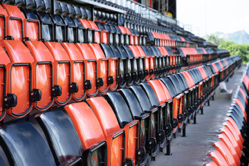 Fototapeta premium Row of empty seats on main stand, sport event concept