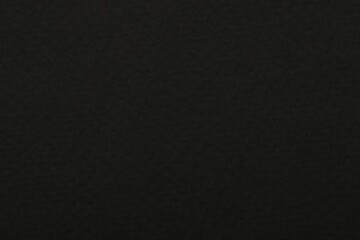 Texture of black paper sheet as background, top view