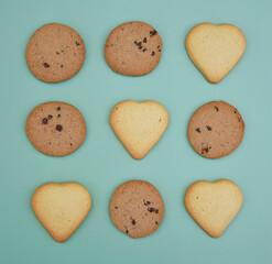 Heart shaped cookies. Tic tac toe with cookies, flat lay