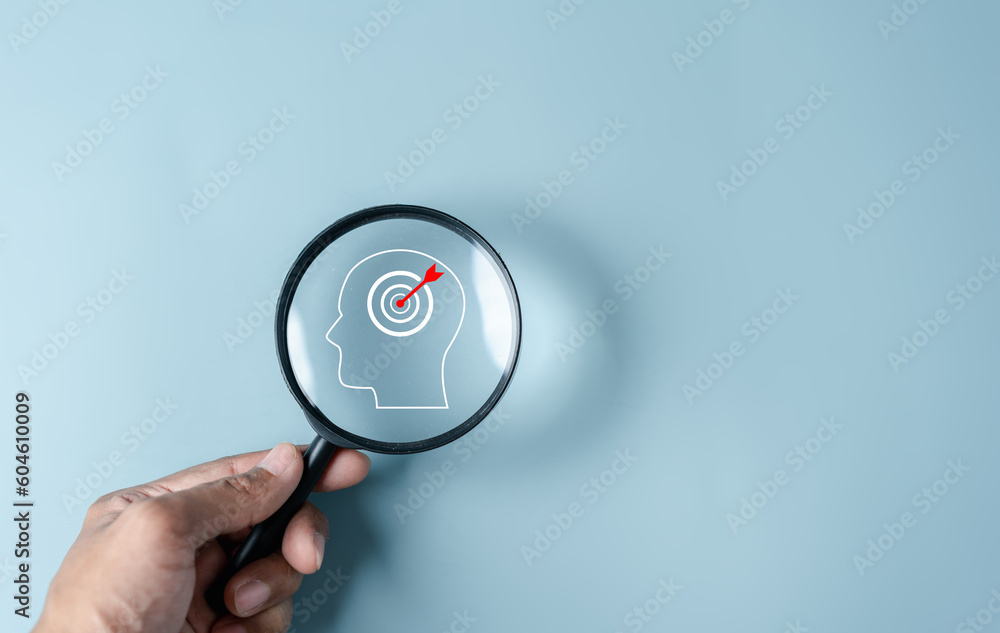 Aufkleber magnifying glass focus to human brain and target objective icon inside for plan, thinking business s