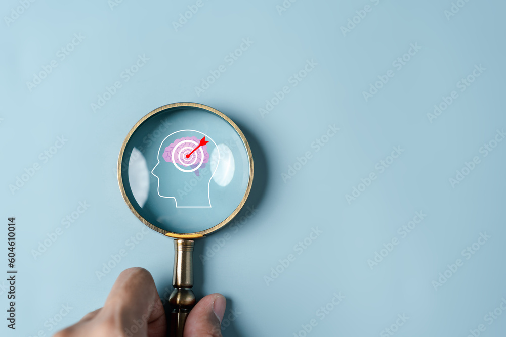 Aufkleber magnifying glass focus to human brain and target objective icon inside for plan, thinking business s