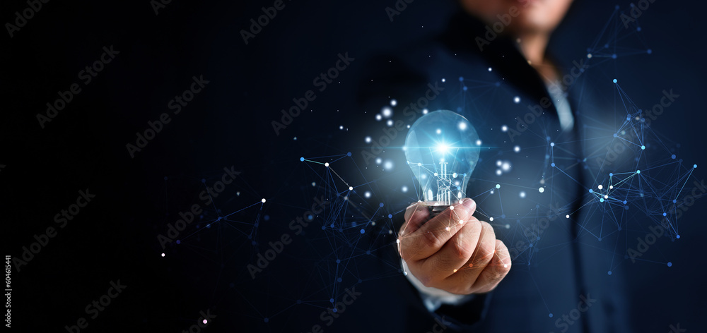 Poster glowing illuminated blue lightbulb in businessman hand with network connection line. innovative idea