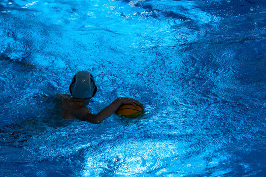Waterpolo game swimmer player in action. Horizontal sport theme poster, greeting cards, headers, website and app