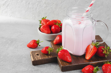 Strawberry Drink, Shake, Smoothie with Fresh Strawberry on Grey Background, Glass with Tasty Refreshing Drink