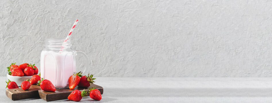Strawberry Drink, Shake, Smoothie with Fresh Strawberry on Grey Background, Glass with Tasty Refreshing Drink