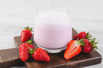 Strawberry Drink, Shake, Smoothie with Fresh Strawberry on Grey Background, Glass with Tasty Refreshing Drink