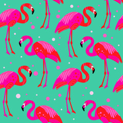 Fototapeta premium Beautiful seamless vector tropical pattern with pink flamingos on a green background. Abstract summer texture