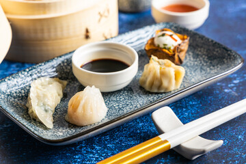 Dim sum steamed in a bamboo basket.