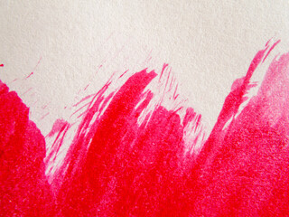 Red paint and splash and white background, copy space above.