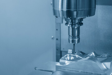 The CNC milling machine cutting  mold part by solid ball end mill tool.