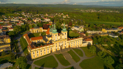 Fototapeta na wymiar Aerial view of Virgin Mary's basilica during sunset. Photographed in Svatý Kopeček town near Olomouc city. 