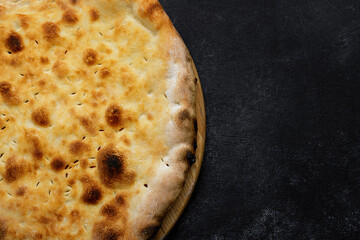 baked georgian shoti bread on wooden board