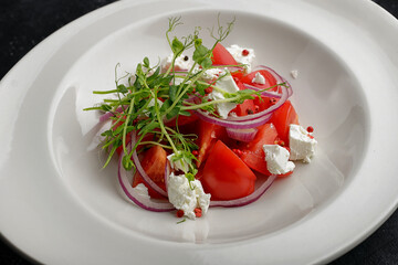 fresh tomato feta salad with spring greens and microgreens