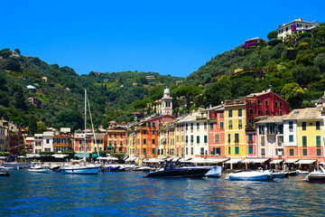 Portofino, Italy. Beautiful colorful buildings and boat filled harbor.