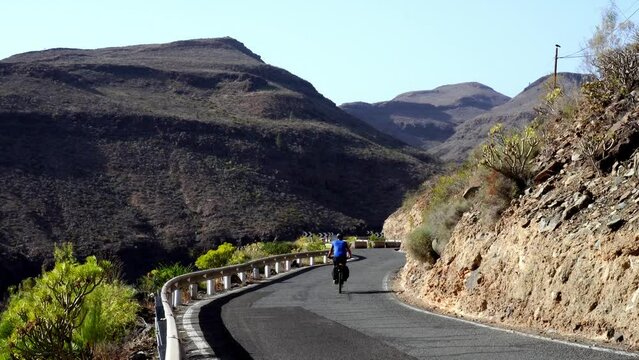 Cyclists riding the mountain roads of Gran Canaria, Canary Islands