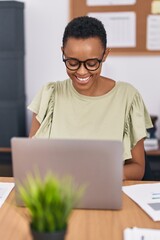 African american woman business worker using laptop working at office